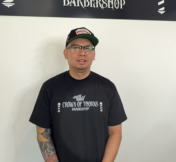 Marvin, Barber at Crown of Thorns Barbershop