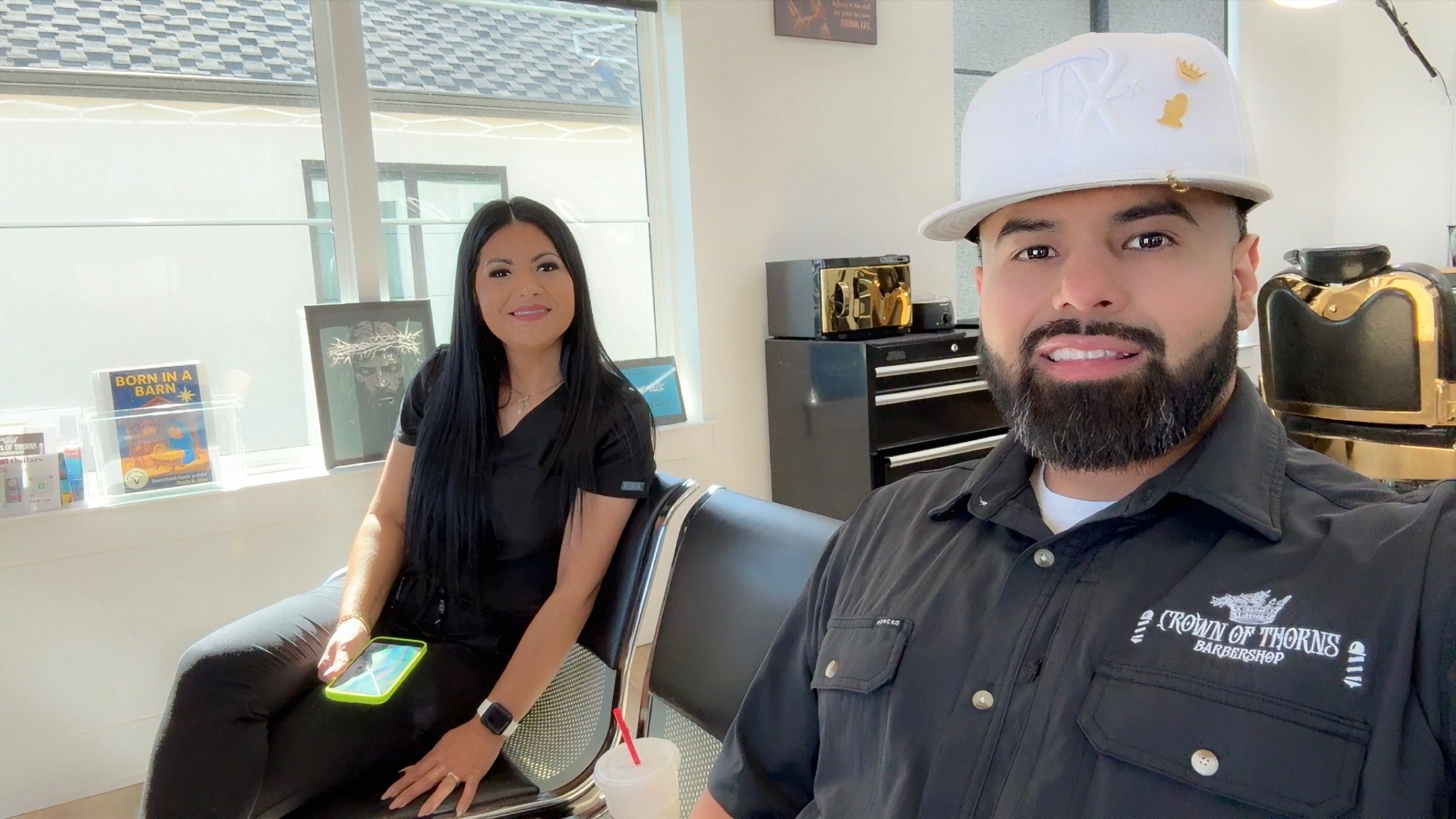 Michael and Victoria inside Crown of Thorns Barbershop