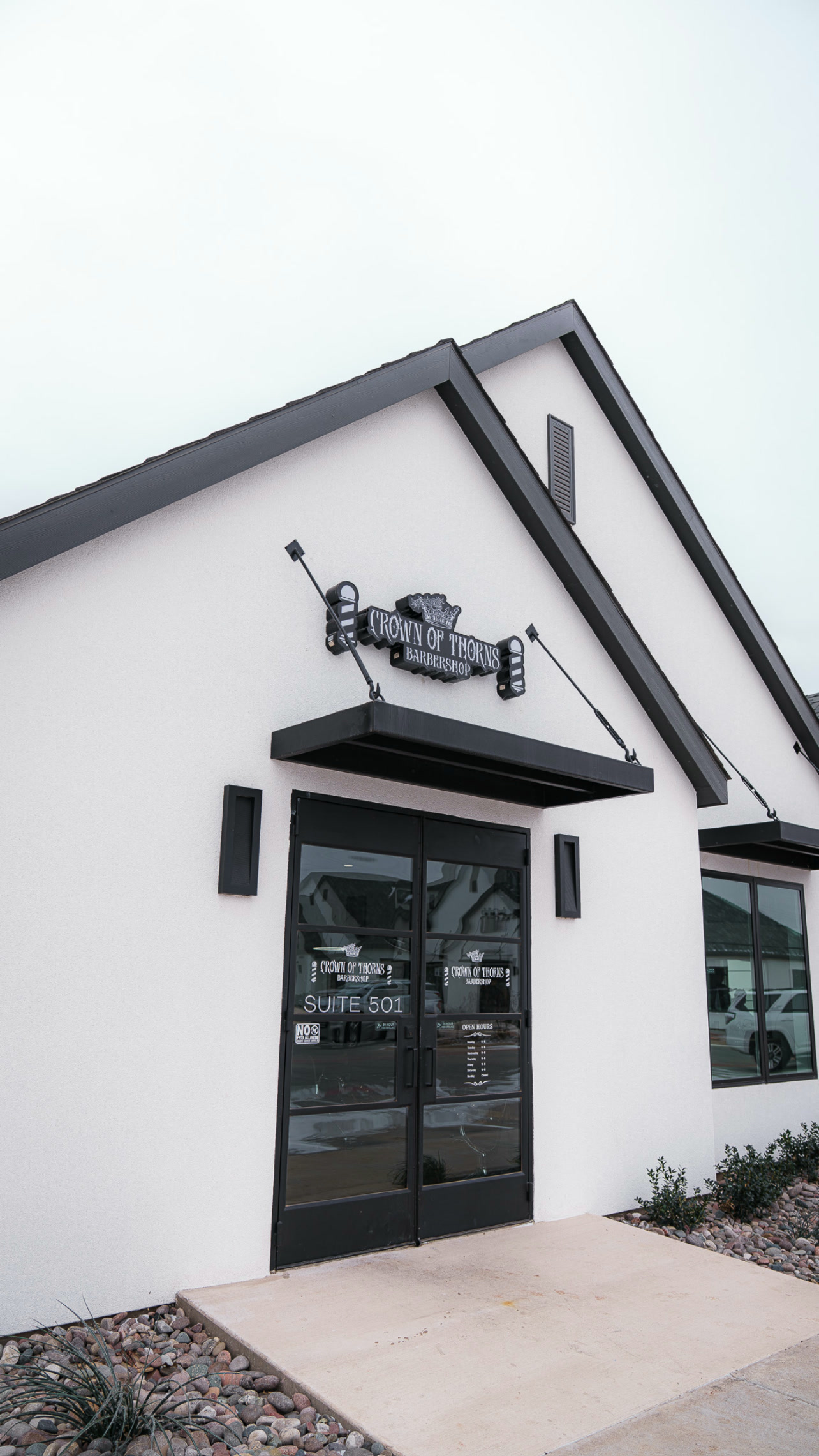 Crown of Thorns Barbershop and its Suite 501 entrance in Abilene