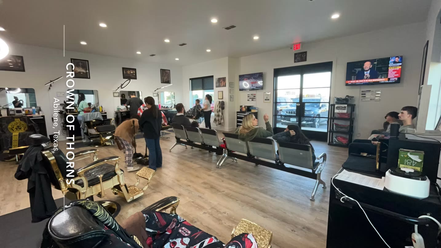 The welcoming interior and barber stations at Crown of Thorns Barbershop